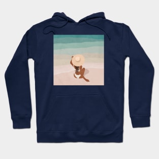 Girl in hat on the beach Hoodie